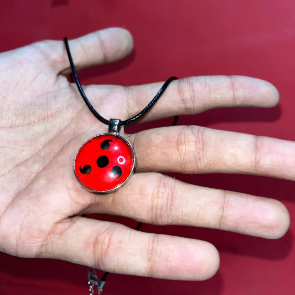 Sharingan necklace 1